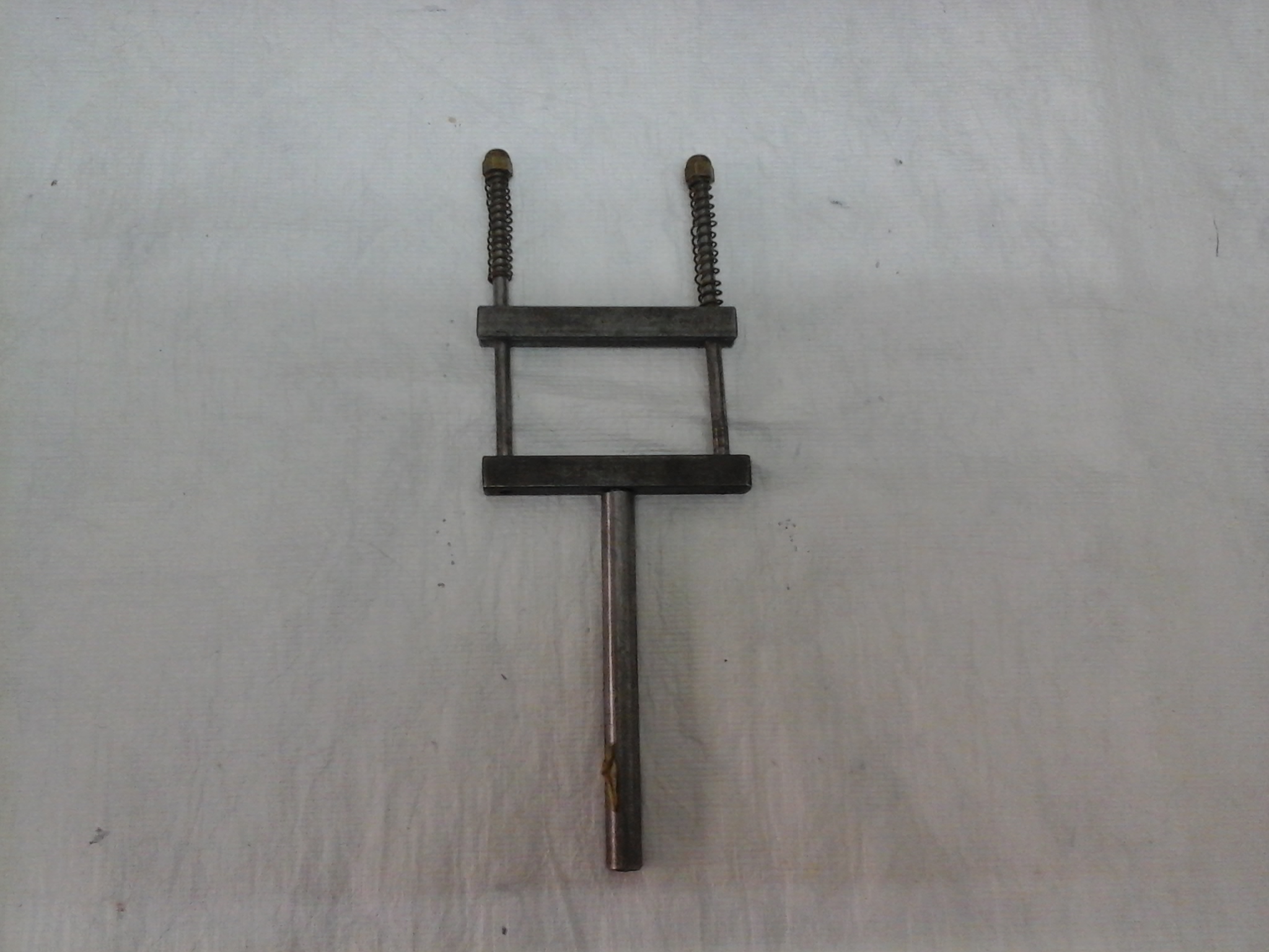 Soporte para agarre de lentes