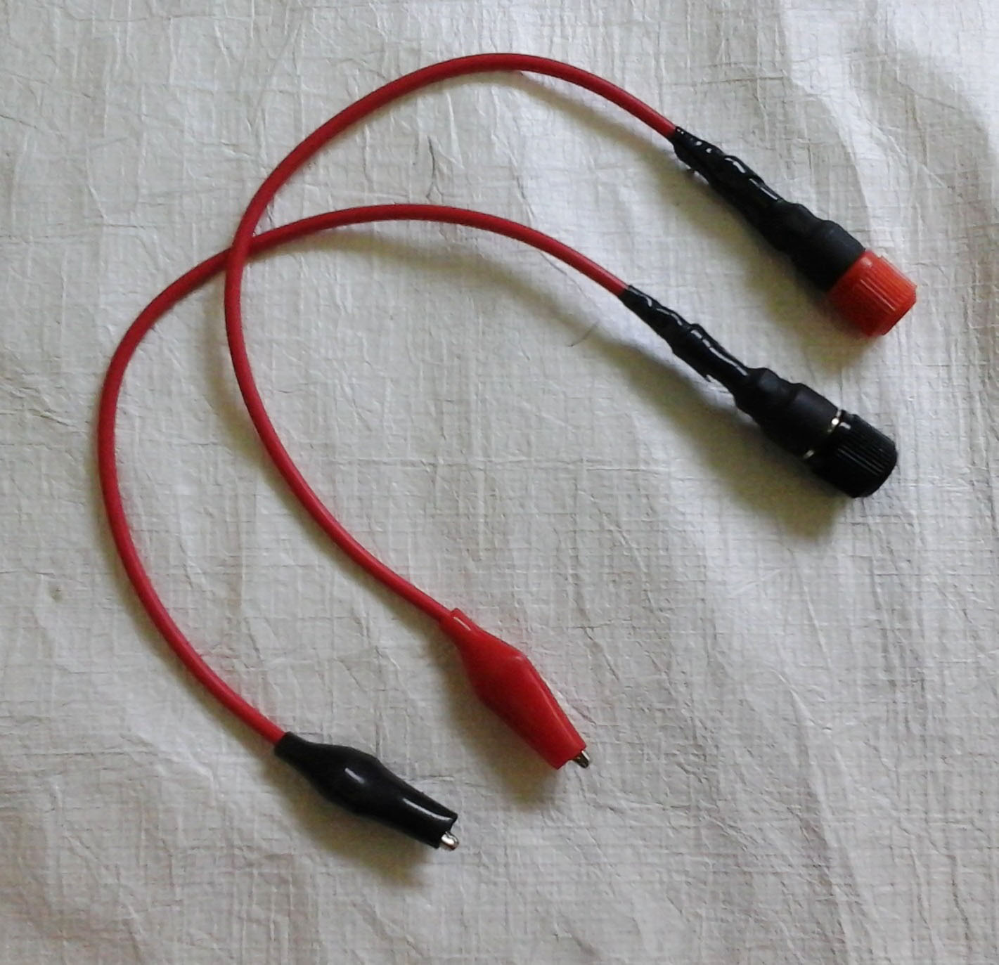 Adaptador banana-cocodrilo